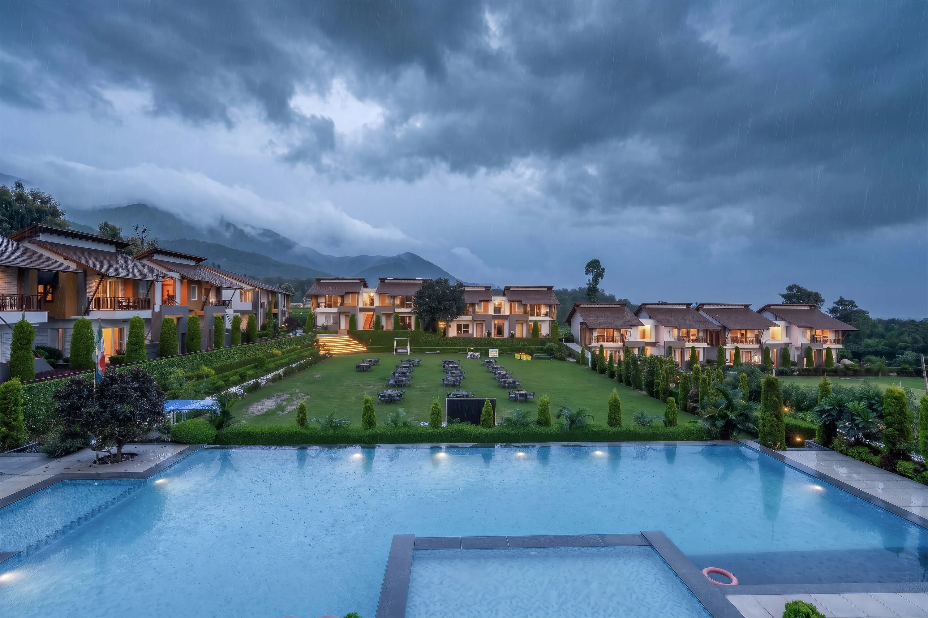 The pool deck and restaurant at Evara